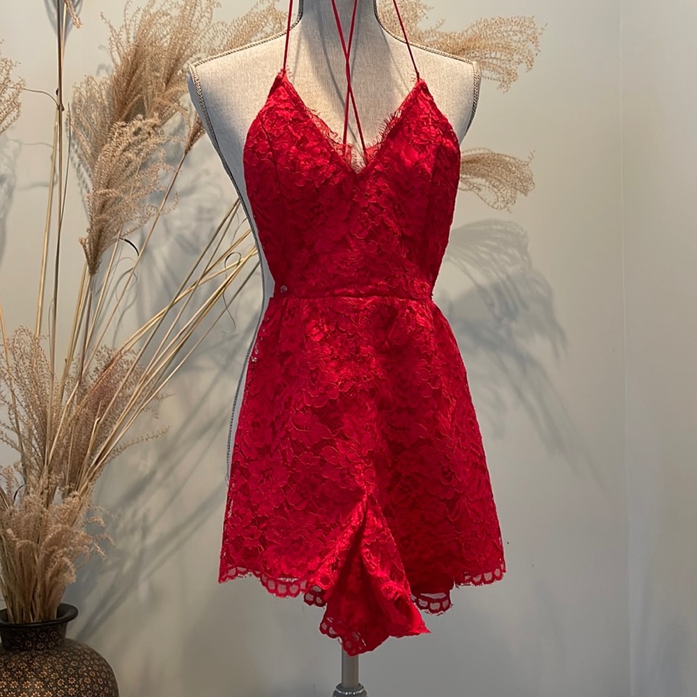 Red hot lace romper by NBD. Size S.